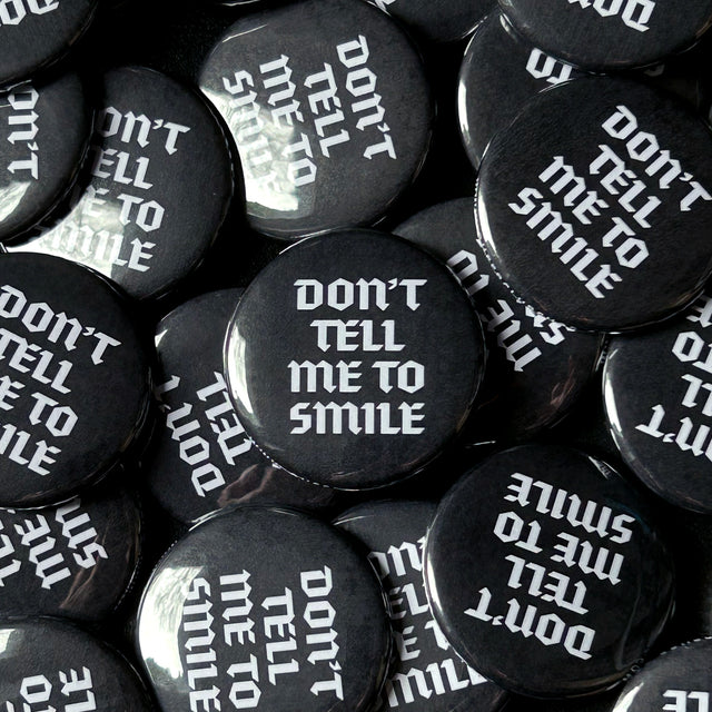 No Smiles Button